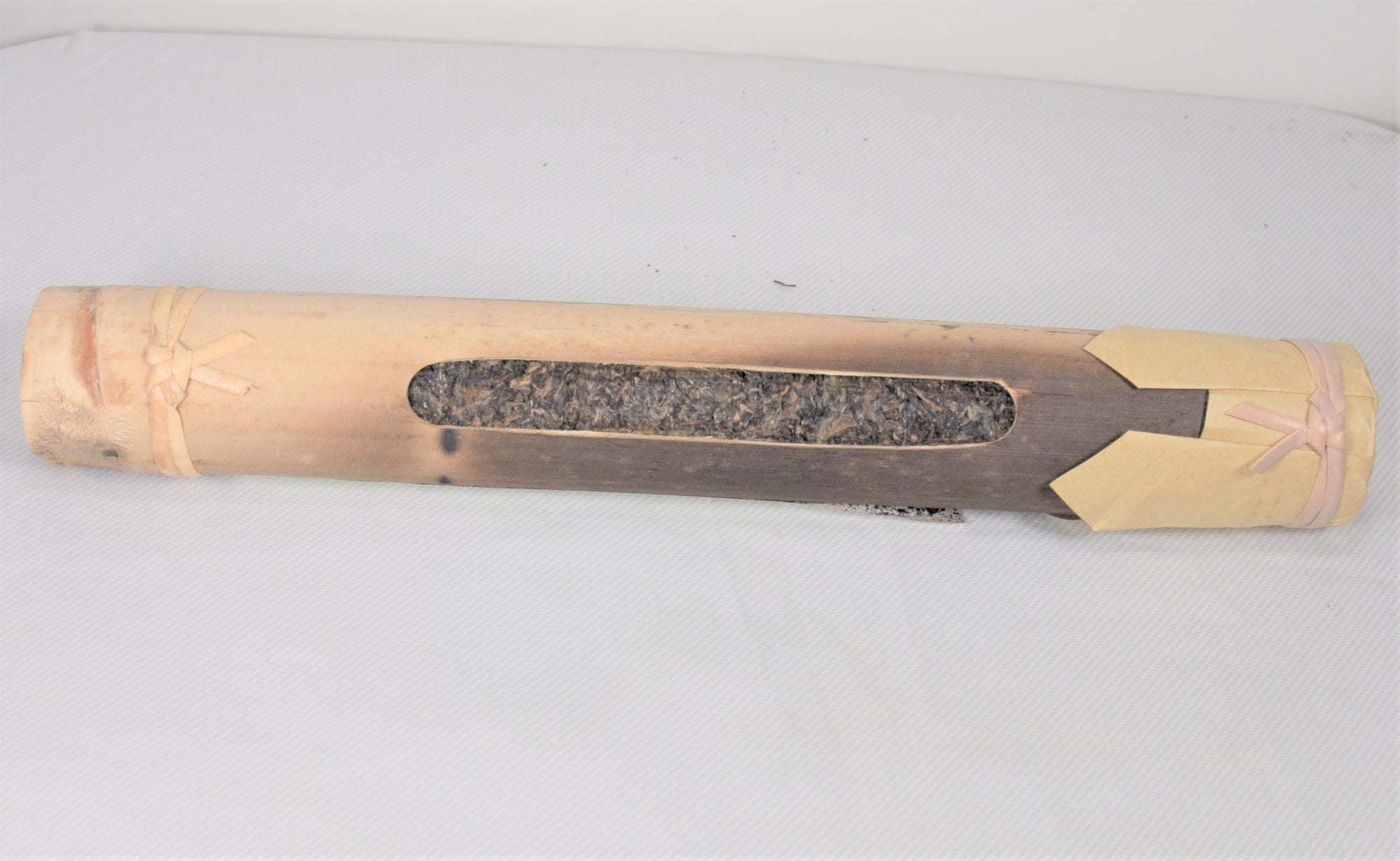 2009 Ji Nuo Wild Tree Pu Er (Sheng) aged in bamboo tube